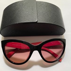 Prada cat eye sunglasses. Black with pink interior.